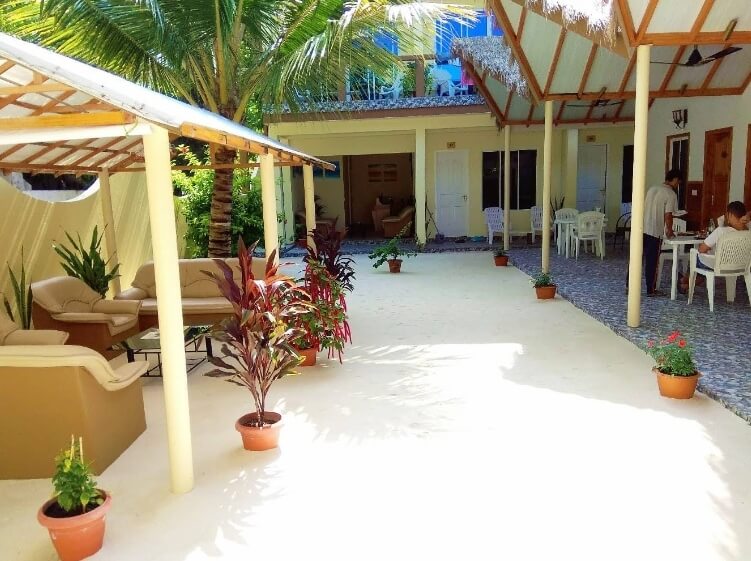Courtyard and terrace of Relax Residence guesthouse on Thoddoo island, Maldives