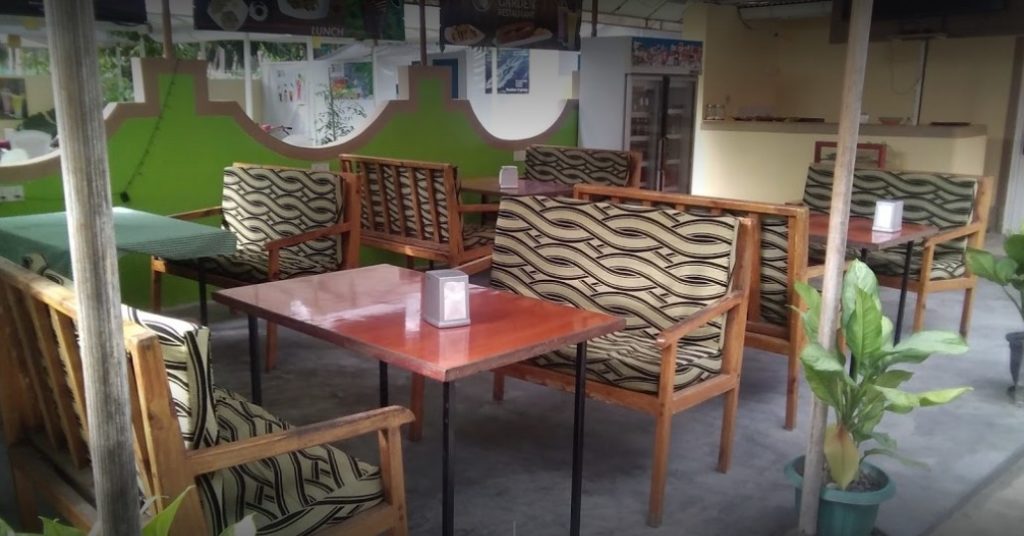 Cafe seating area with zebra-print armchairs on Thoddoo
