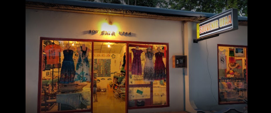Clothing and souvenir shop at night on Thoddoo